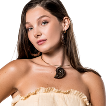 Load image into Gallery viewer, Carved Walnut Ammonite