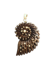 Load image into Gallery viewer, Carved Walnut Ammonite