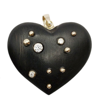 Load image into Gallery viewer, Carved Ebony Studded Heart Pendant
