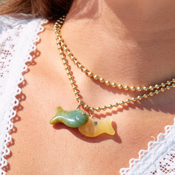 Carved Stone Fish Pendants